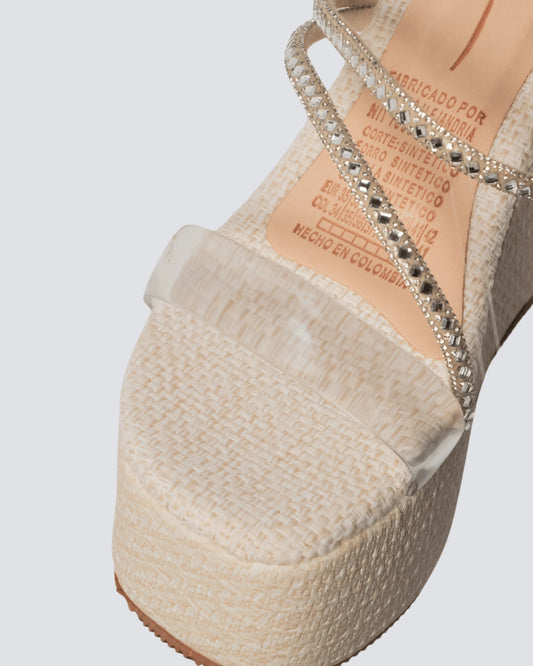 PLATAFORMA YUTE CON TIRA TRANSPARENTE BEIGE